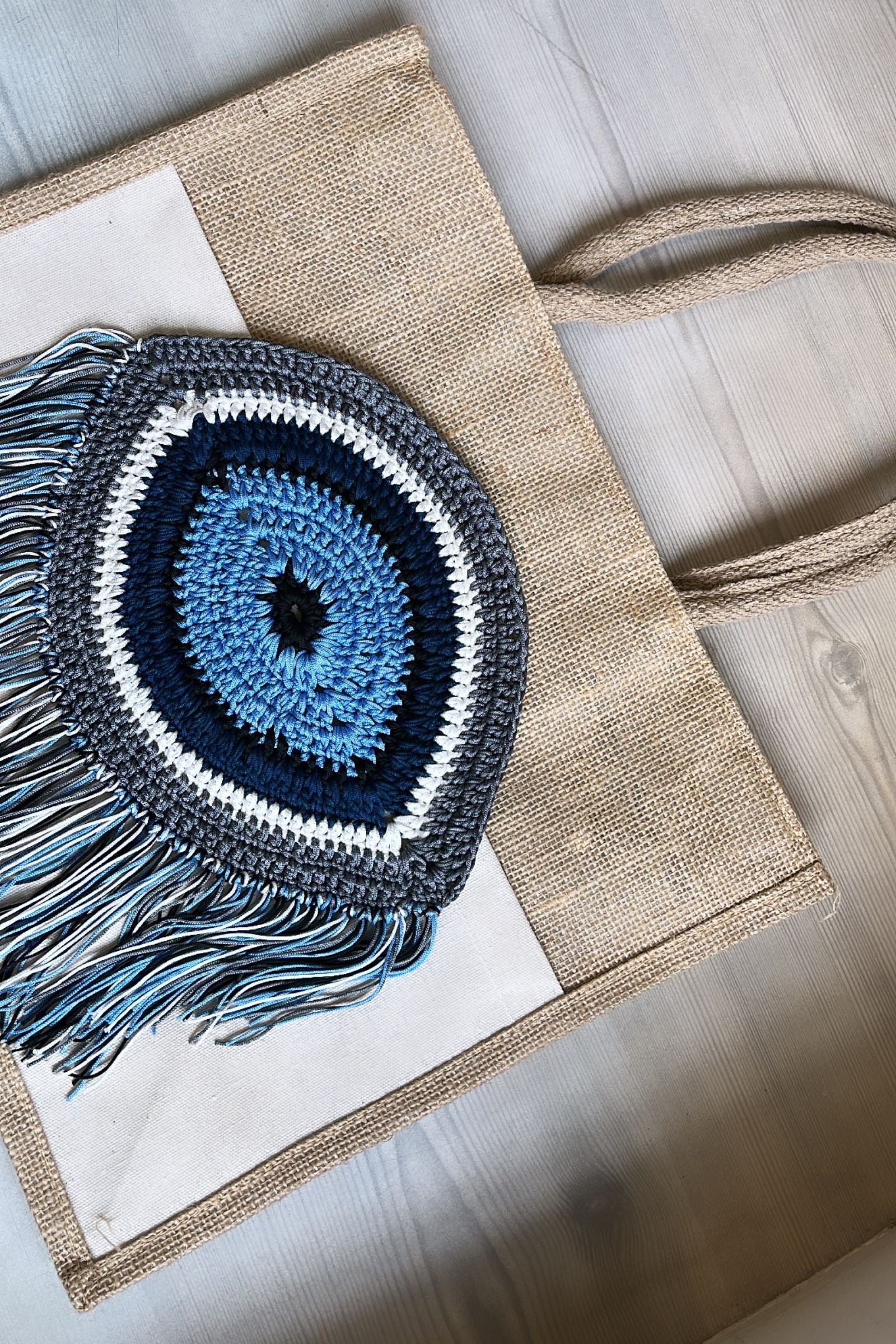EVIL EYE JUTE BAG