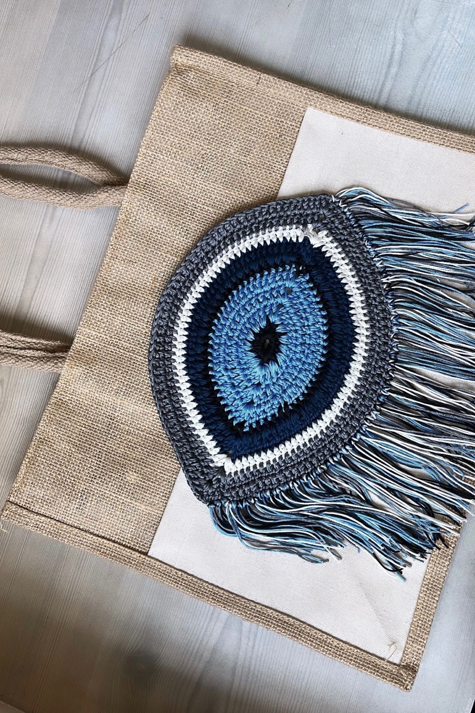 EVIL EYE JUTE BAG