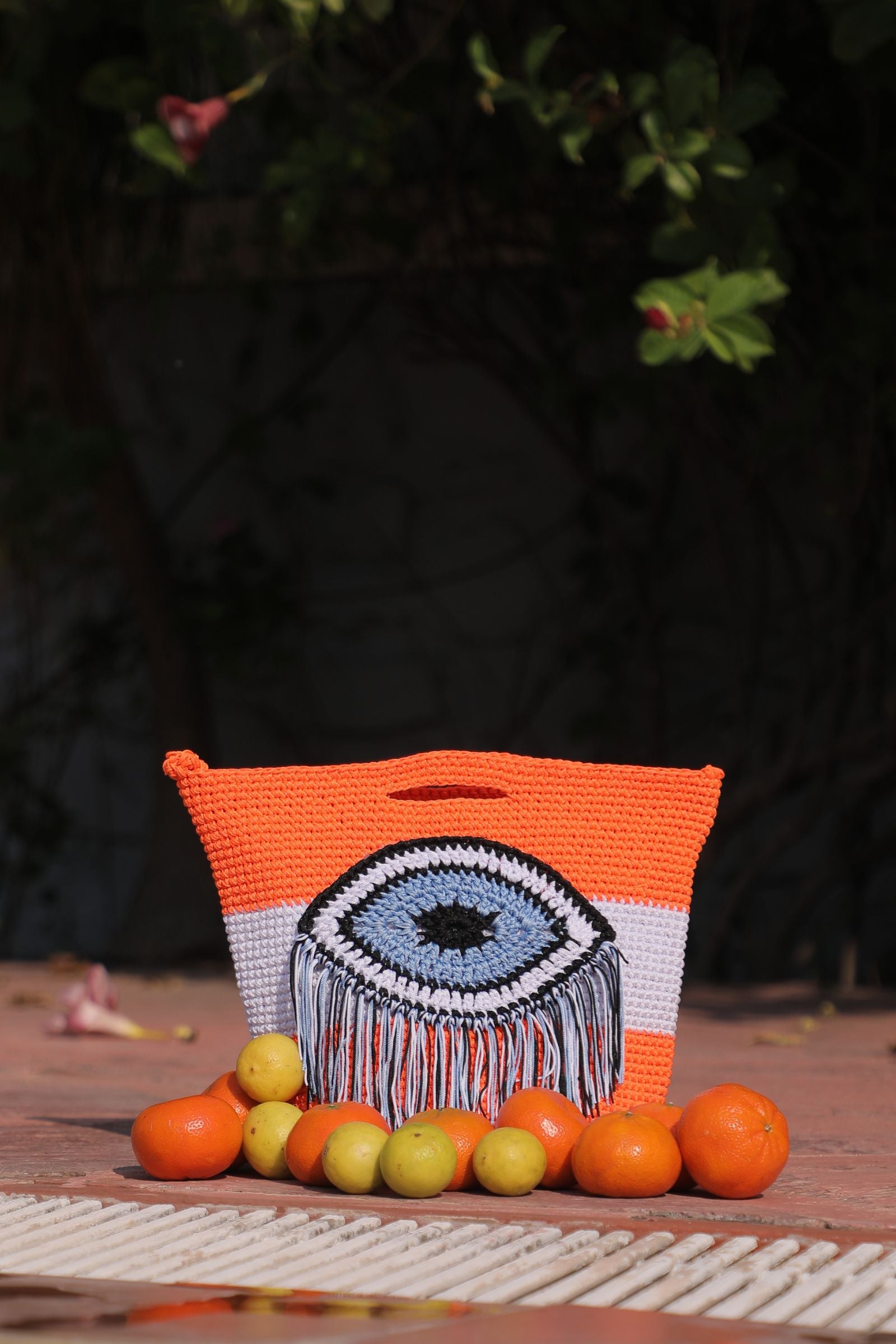 CANNA LILY EVIL EYE SLING