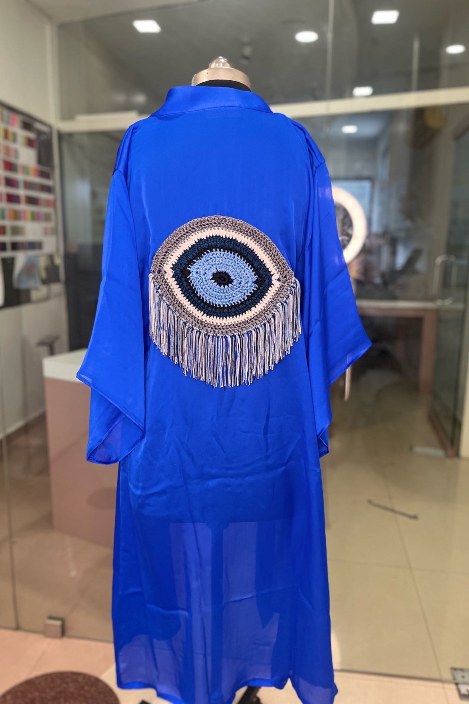 EVIL EYE KIMONOS WITH A CROCHET MOTIF